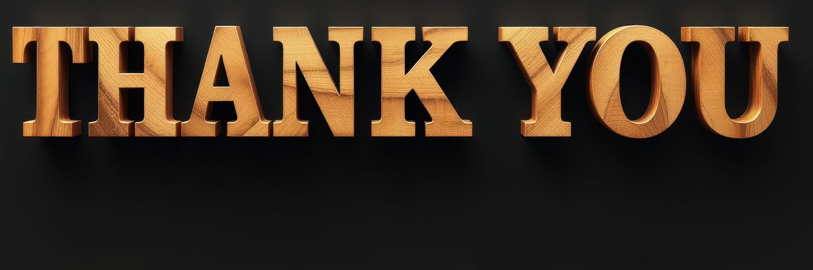 Wooden letters display expressing gratitude in a creative design against a dark background
